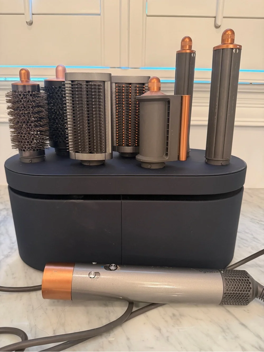 Dyson multi-attachment hair styler in charcoal and copper